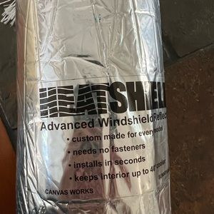 Heatshield windshield protection for a Honda Odyssey.